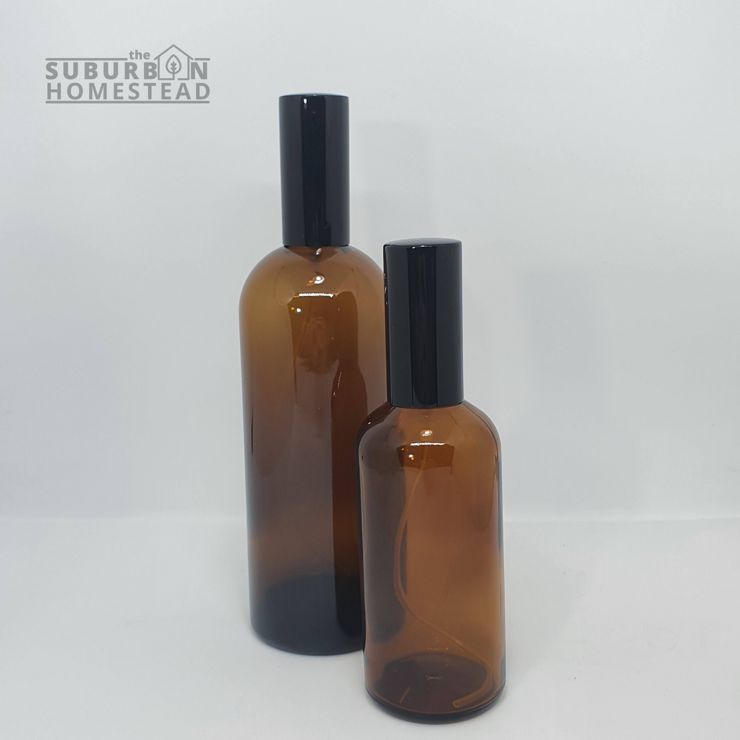 Amber Glass Bottle with Black Spray and Lid (2 sizes)